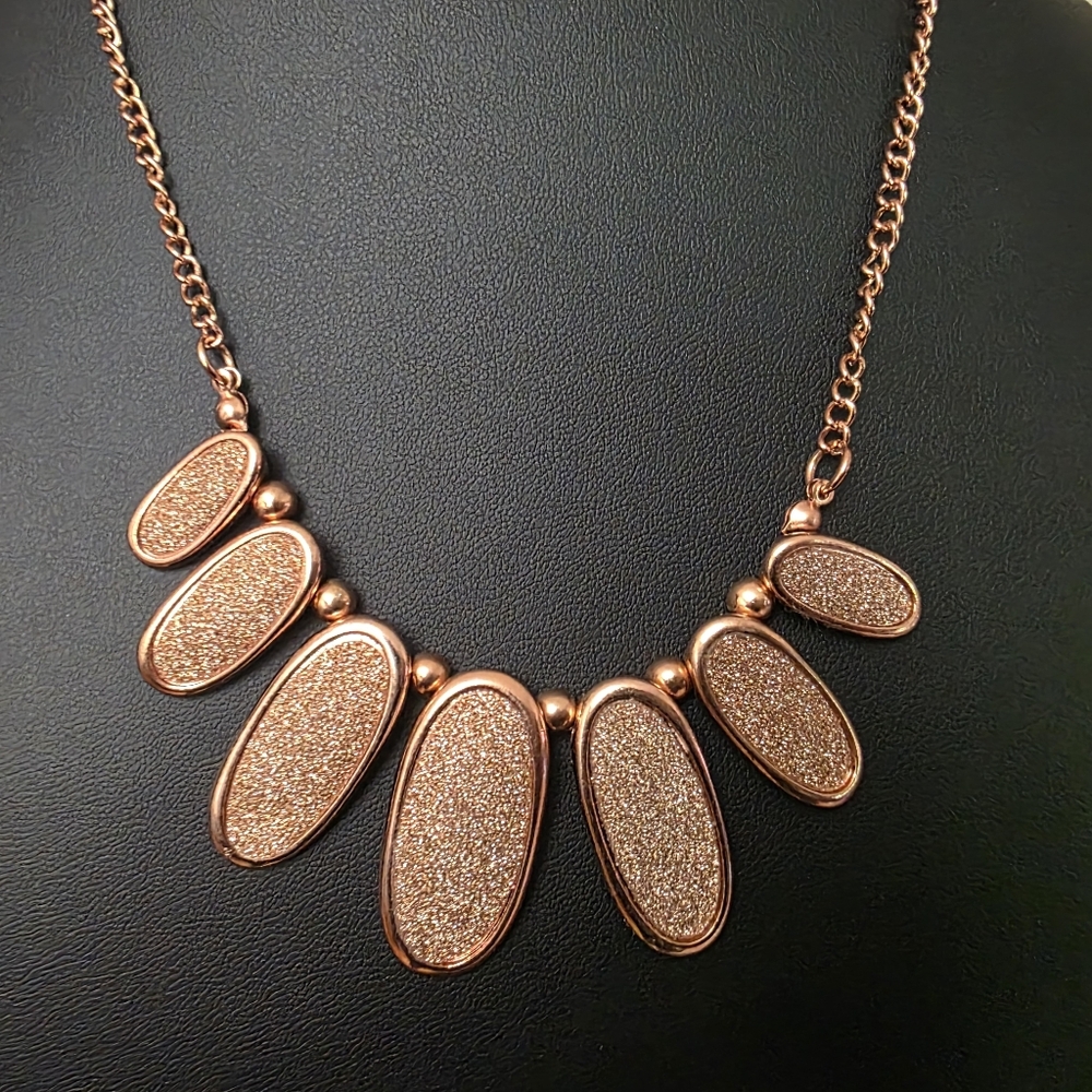 Elegant Rose Gold / CopperTone Necklace with Sparkeling Oval Pendants .